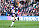 Greig Laidlaw kicks a conversion for Scotland against France