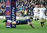 Huw Jones scores a try against England in Calcutta Cup match