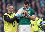 Robbie Henshaw is helped off the field after suffering a shoulder injury against Italy