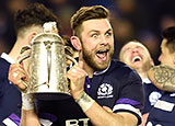 Ryan Wilson celebrates with Calcutta Cup