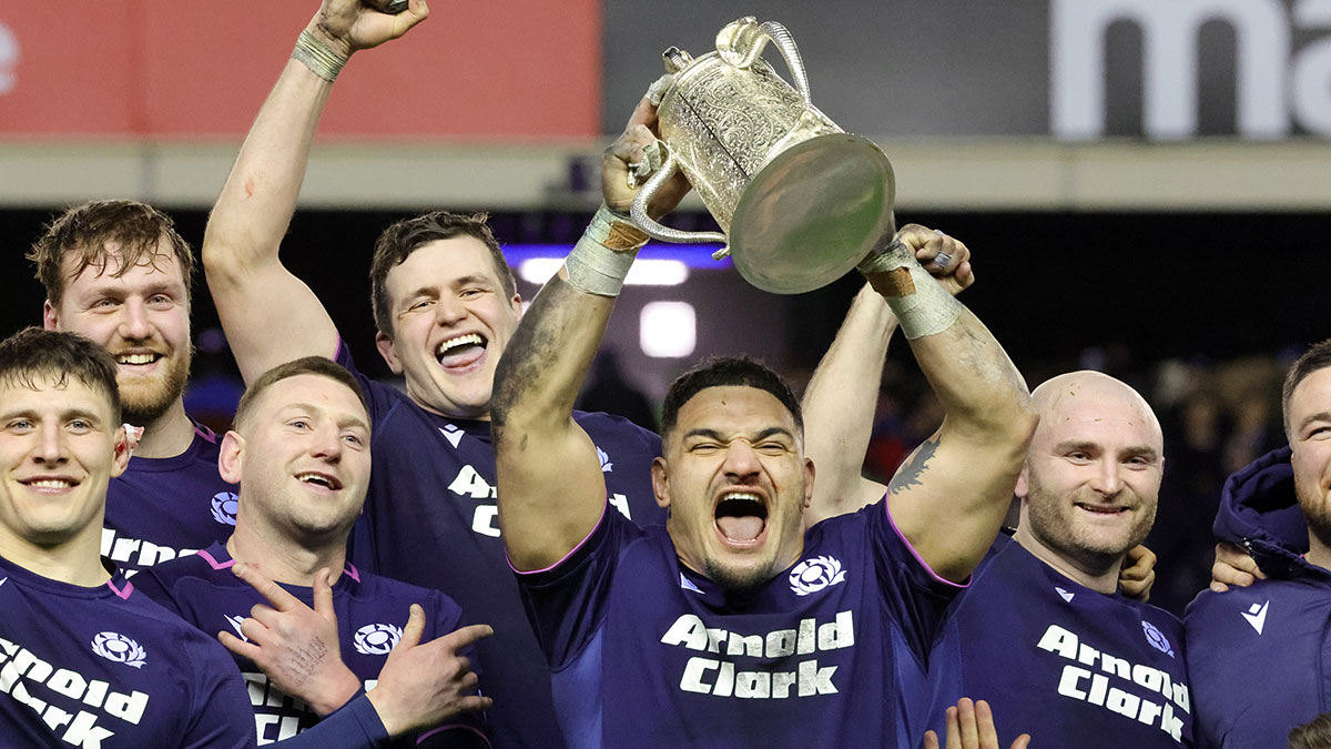 Sione Tuipulotu lifts the Calcutta Cup during 2026 Six Nations