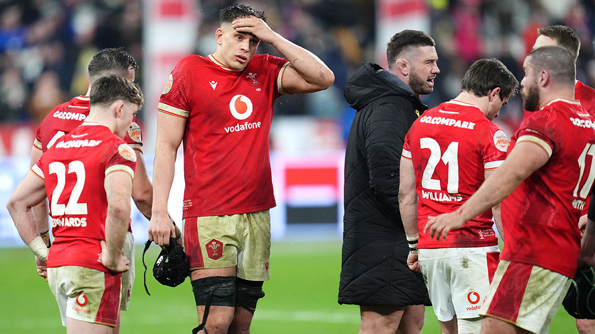 Wales players look dejected after defeat to France in 2025 Six Nations