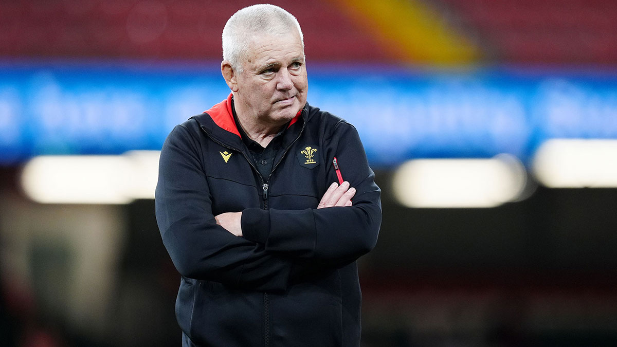 Warren Gatland folds his arms as he watches Wales train