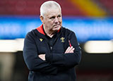 Warren Gatland folds his arms as he watches Wales train